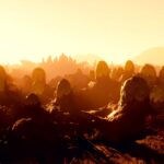 Starfield - paisaje anaranjado al amanecer con formaciones rocosas ovaladas sobre un terreno accidentado