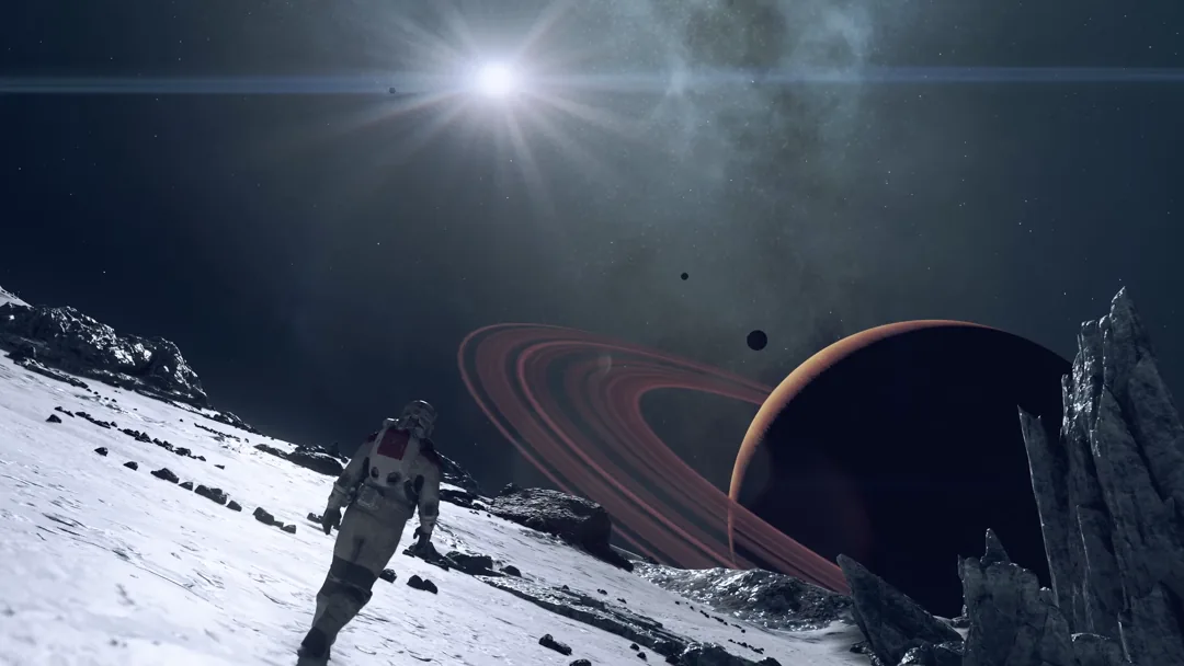 Starfield - astronauta explorando un planeta helado junto a un gigante con anillos