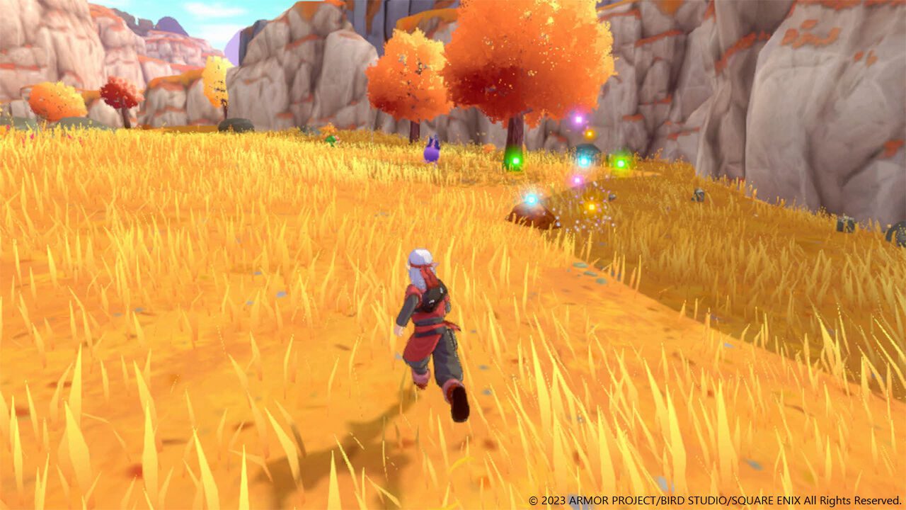 Dragon Quest Monsters: El príncipe oscuro - Psaro corriendo por una pradera de hierba dorada con árboles de hojas naranjas