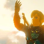 Zelda: Tears of the Kingdom - Link sobre una isla celeste con el vasto mundo de Hyrule al fondo