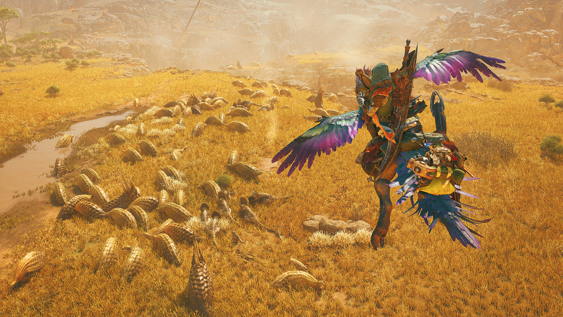 Monster Hunter Wilds - Cazador montado en su Seikret sobrevolando una manada de criaturas - Juegosrpg.com