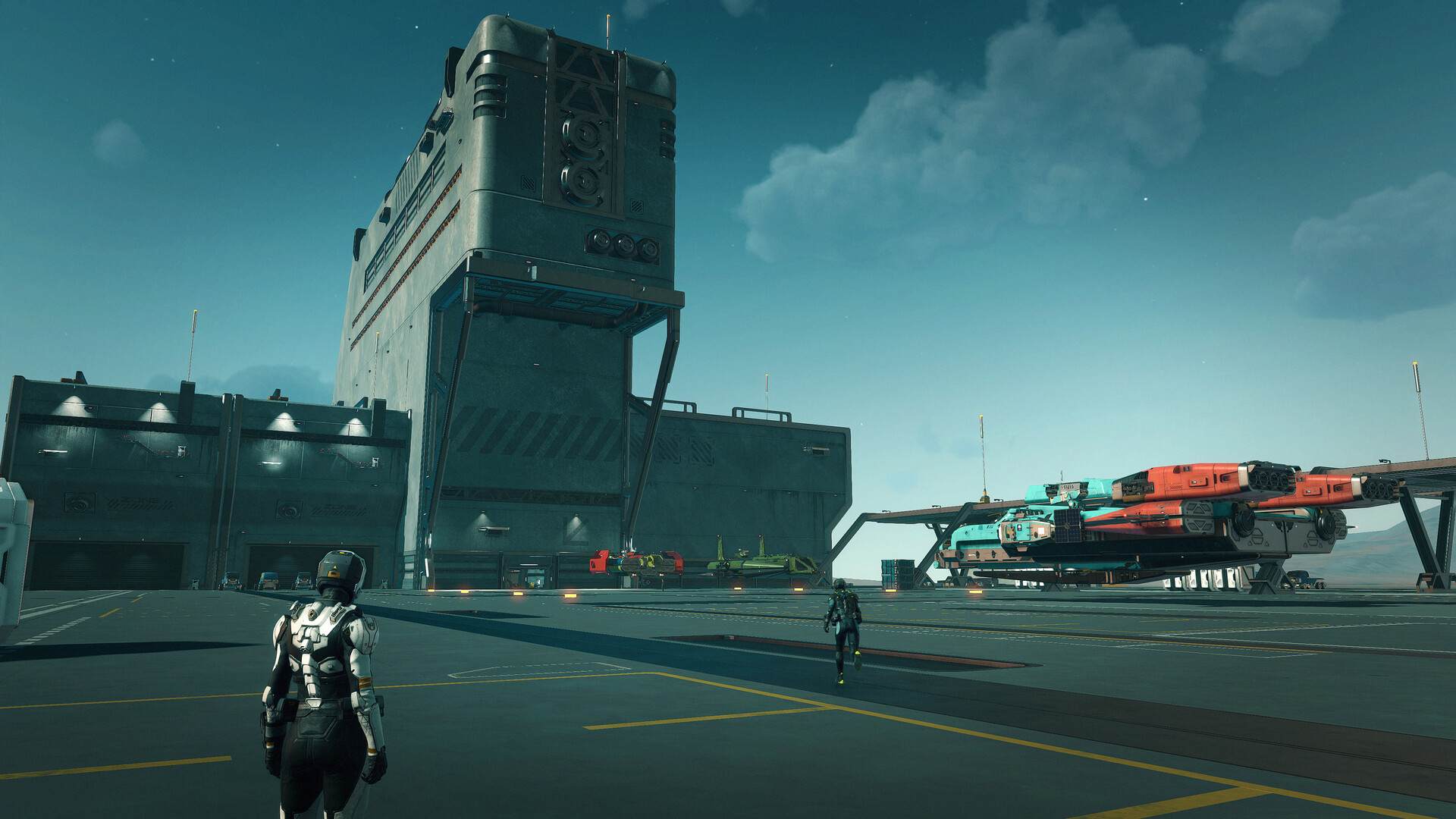SpaceCraft - Base con naves ancladas en la plataforma de despegue y jugadores caminando por el hangar - Juegosrpg.com