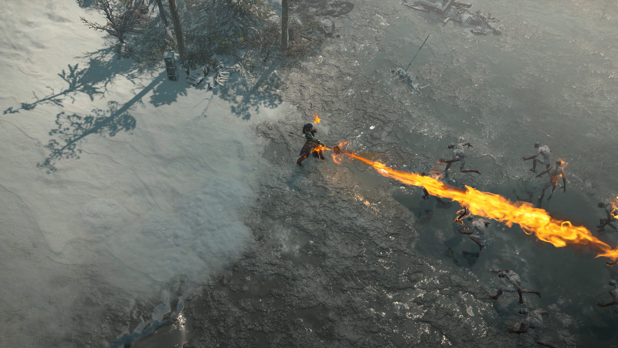 Diablo IV - Un personaje lanza un chorro de fuego en un bosque nevado - Juegosrpg.com