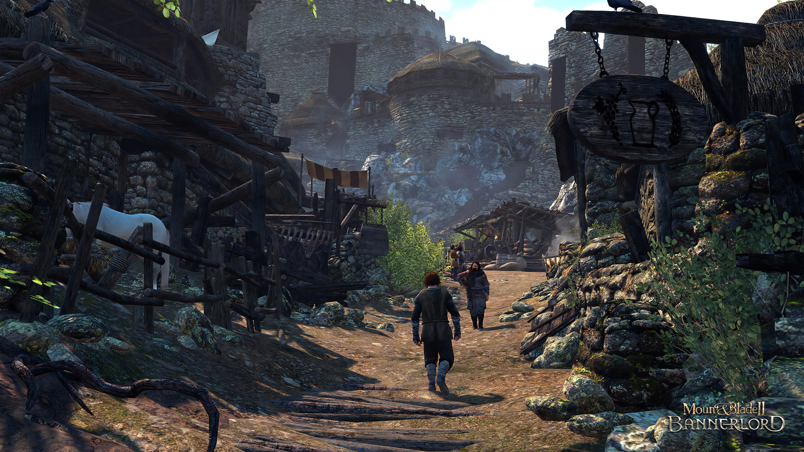 Mount & Blade II Bannerlord - calle de una ciudad medieval de Calradia donde se compra y se vende - Juegosrpg.com